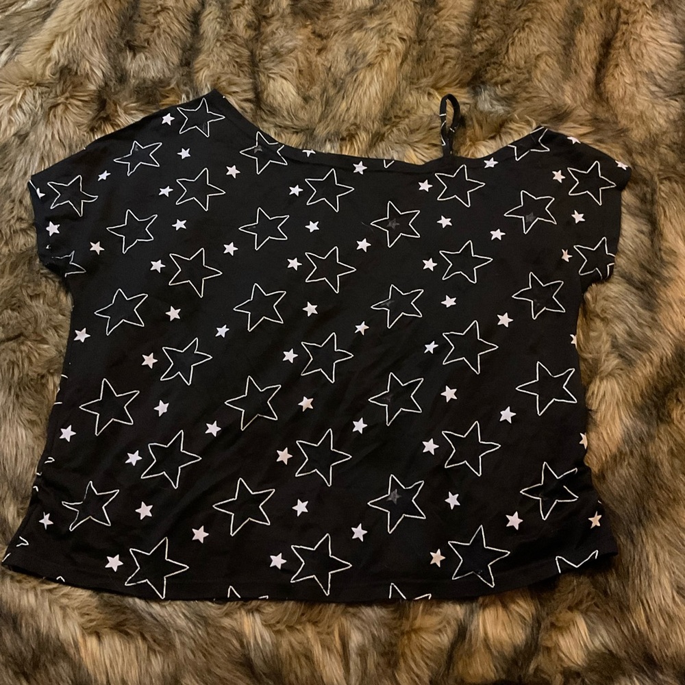 SHEIN Plus Black cold shoulder with white stars and cut outs.